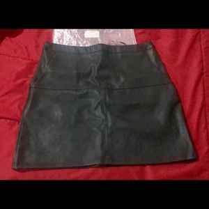 Black leather mini skirt